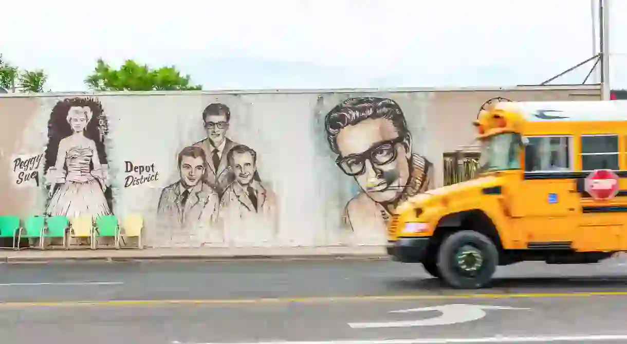 Wall art featuring local legends like Buddy Holly is a common sight throughout the Depot District of Lubbock