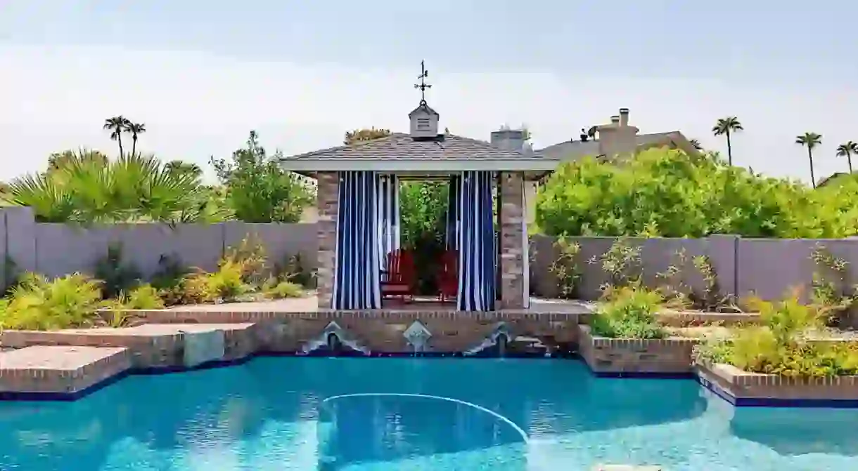 Go for a relaxing swim in the outdoor pool at Everett Street Retreat