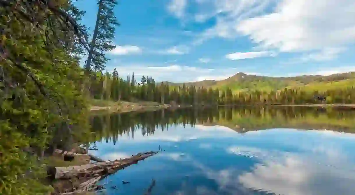 The mountains around Silver Lake provide ample space for hiking in summer and skiing during winter