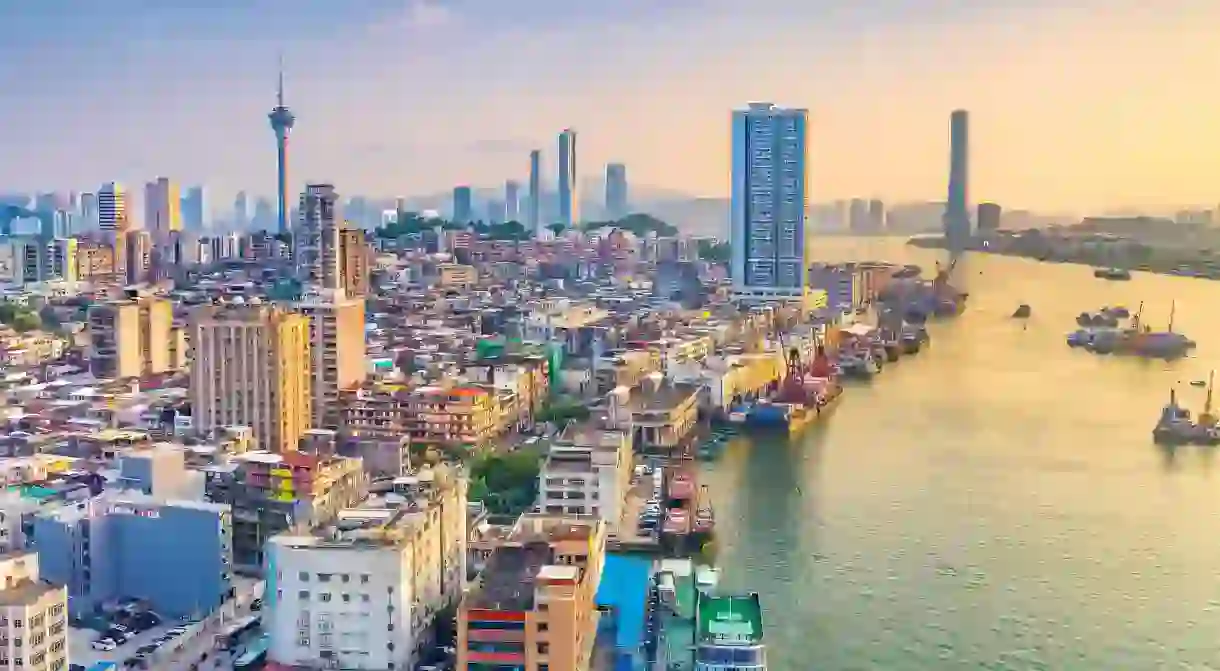 Macau, city skyline at sunset.