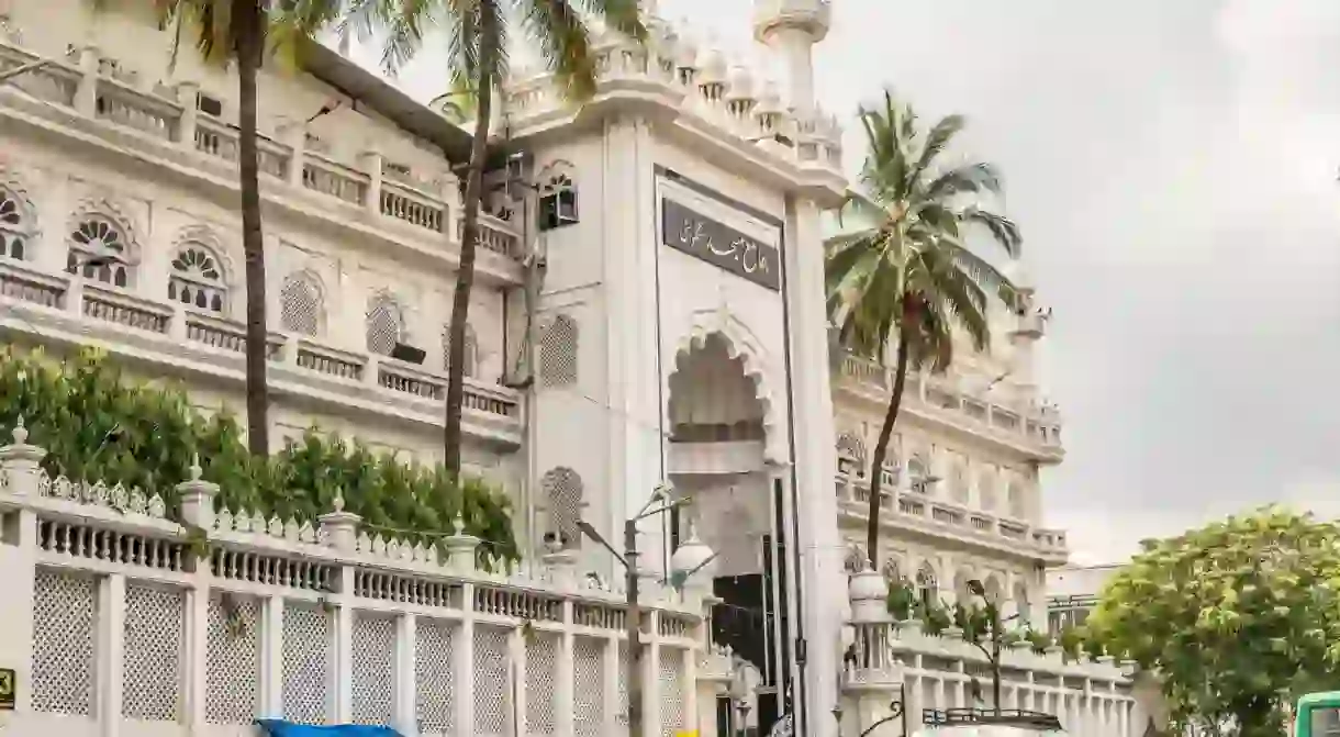 2AB1B7W Bengaluru city, Muslim Jamia Masjid mosque, religion of Islam, tall white towers with gold moon in shape of crescent and star as Islamic symbol