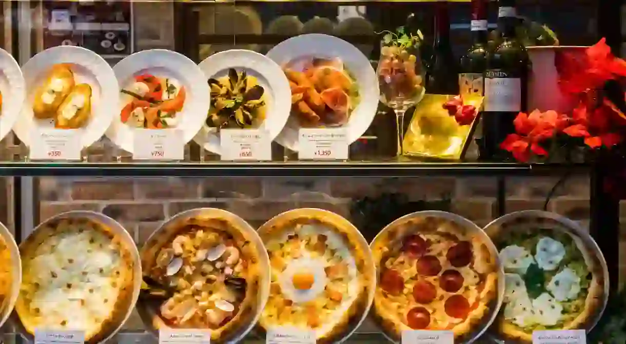 Japan, Honshu, Tokyo, Italian Restaurant Window Display of Plastic Italian Food