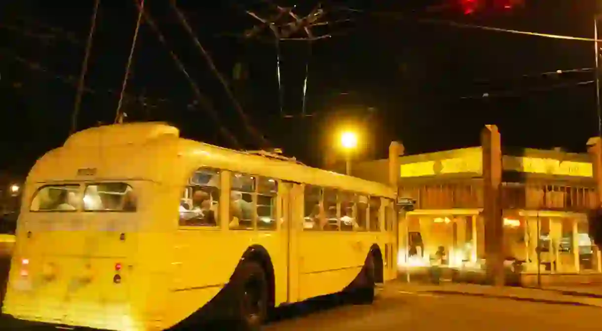 A 1944 Pullman bus taking passengers through Madrona in Seattle