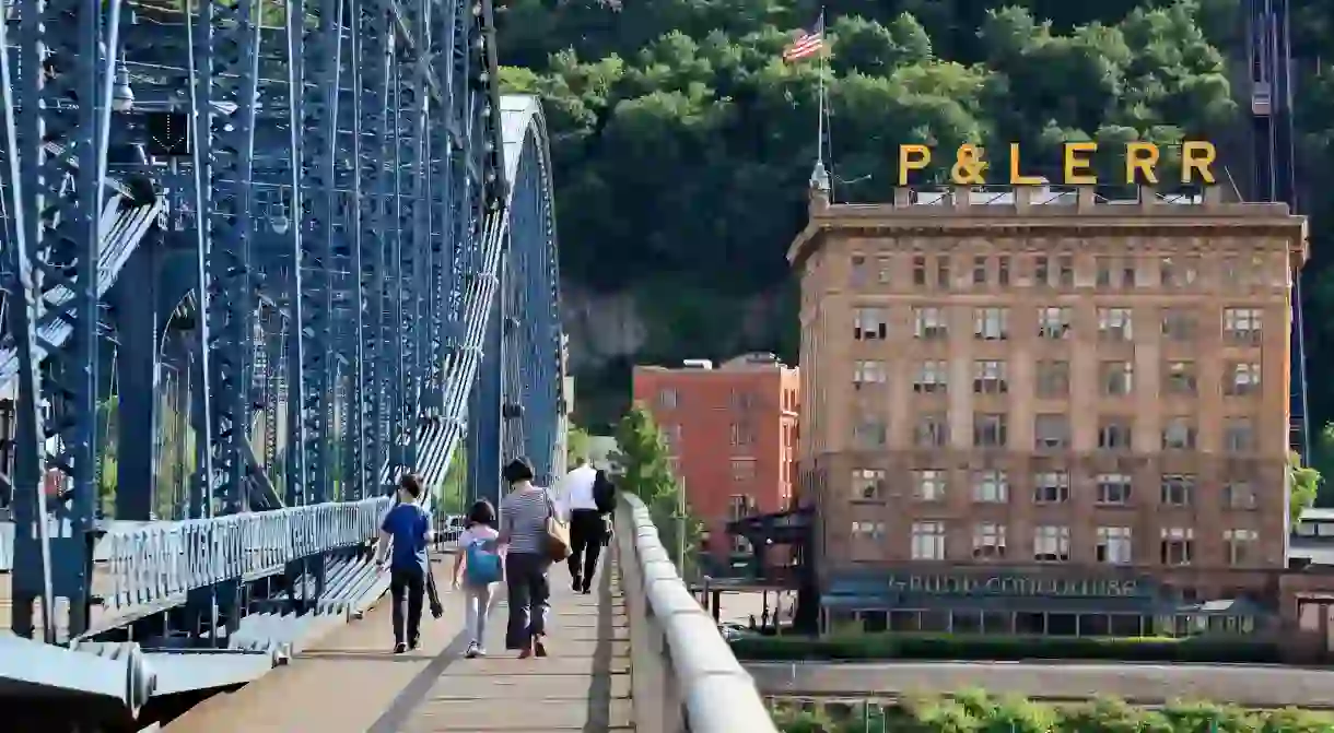 The Smithfield Street Bridge over Monongahela River with Pittsburgh & Lake Erie Railroad Station in the background