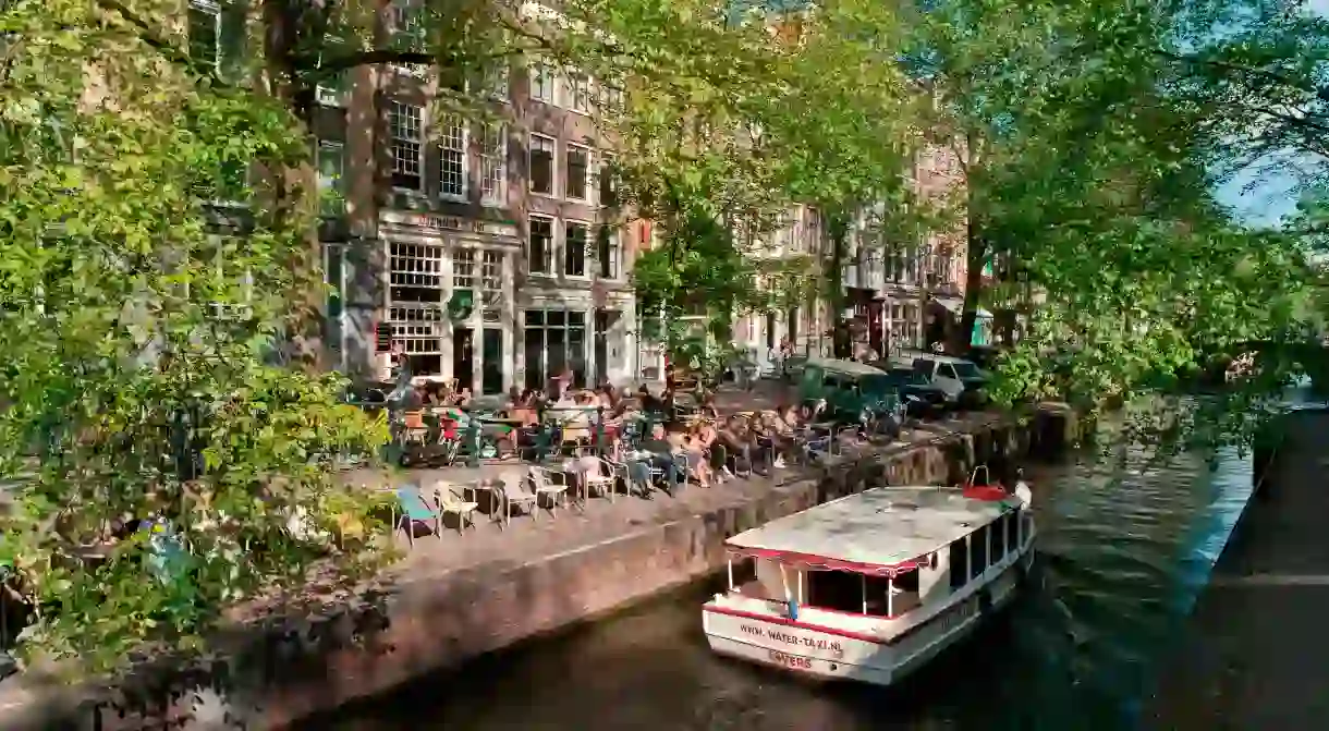 Cafe on a canal bridge, Jordaan district, Amsterdam, Holland