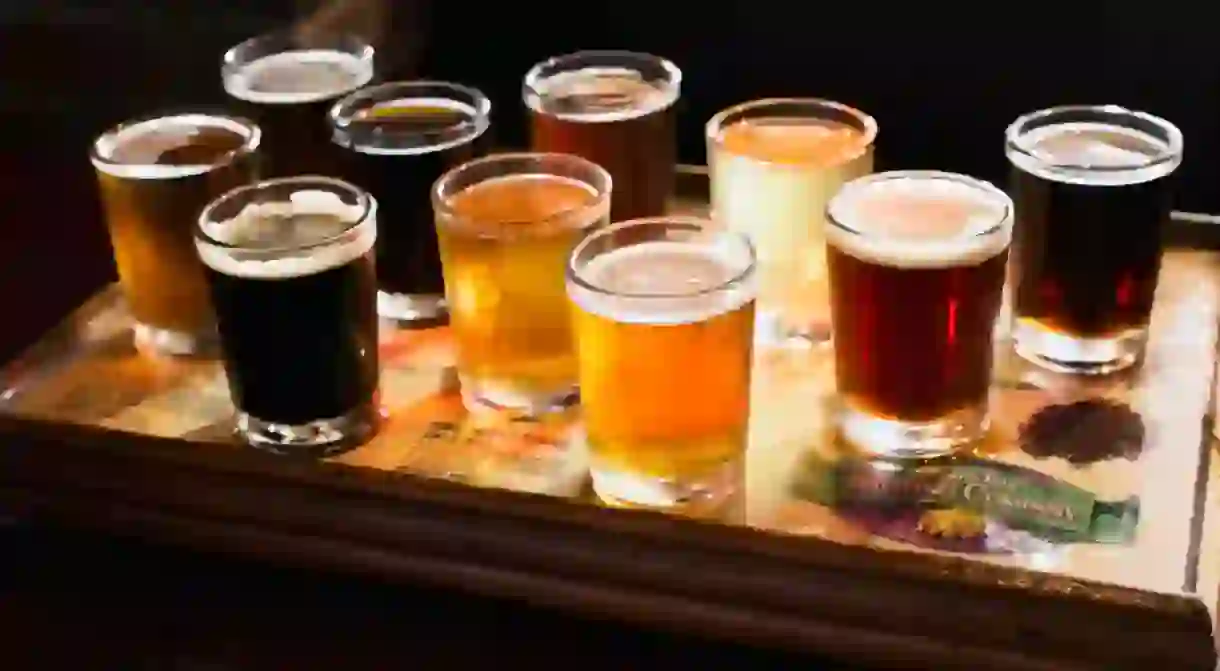 flight of beers for tasting in a brew pub