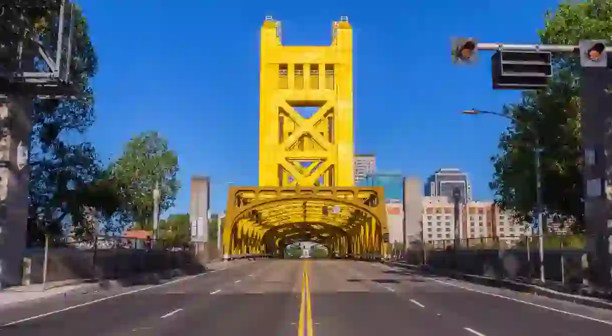 Historic Tower bridge leading towards the state capitol in Sacramento, California.