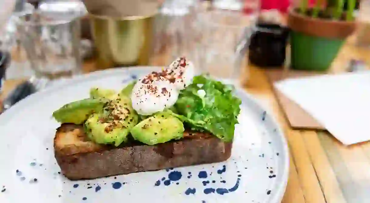 RY4BDW Toast with Avocado and Poached Egg, perfect and healthy breakfast