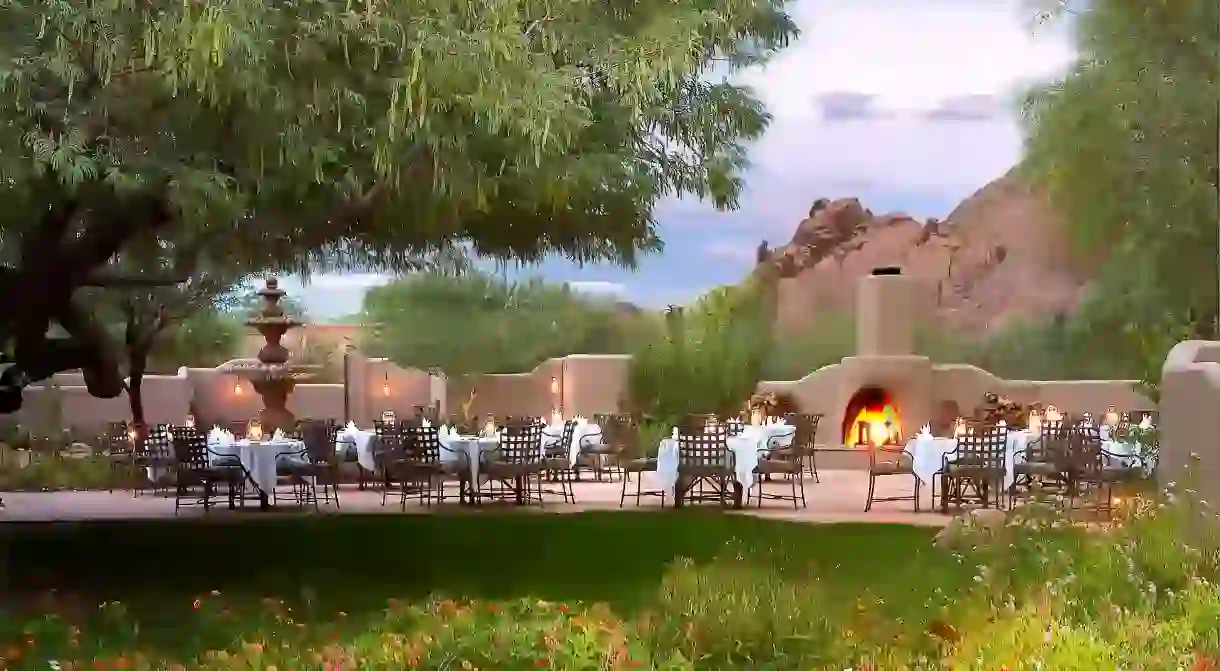 Dine al fresco with a mountain backdrop at the Hermosa Inn