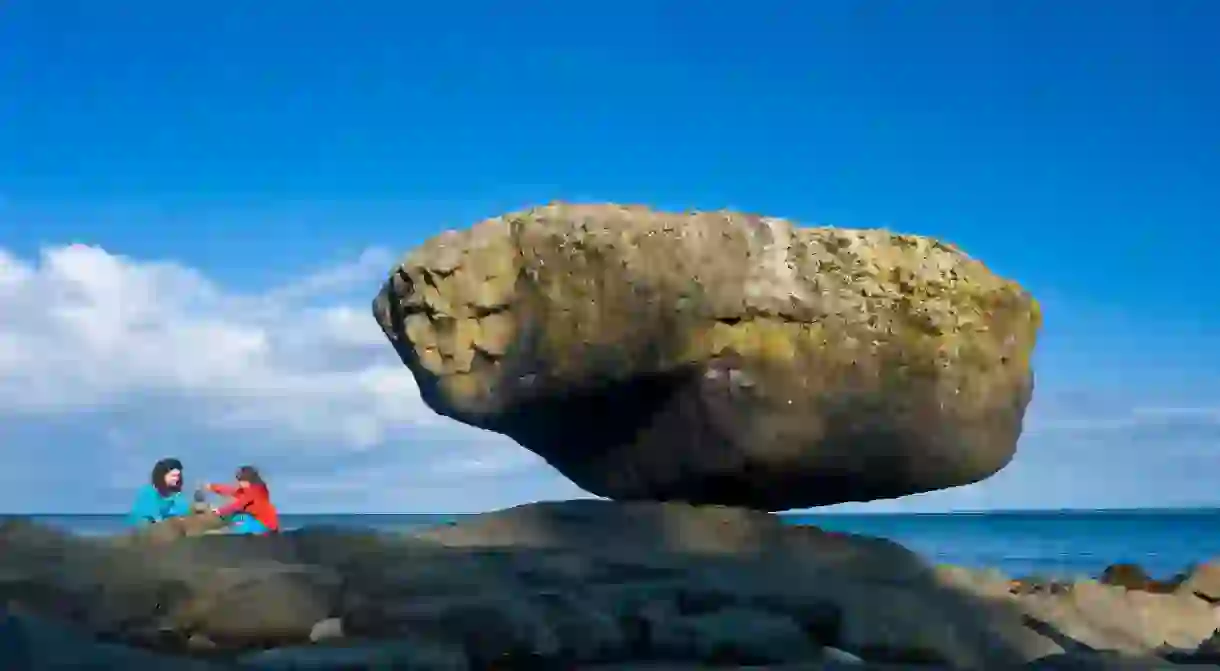 Balance Rock, Graham Island, is thought to be a rock left behind from the ice ages