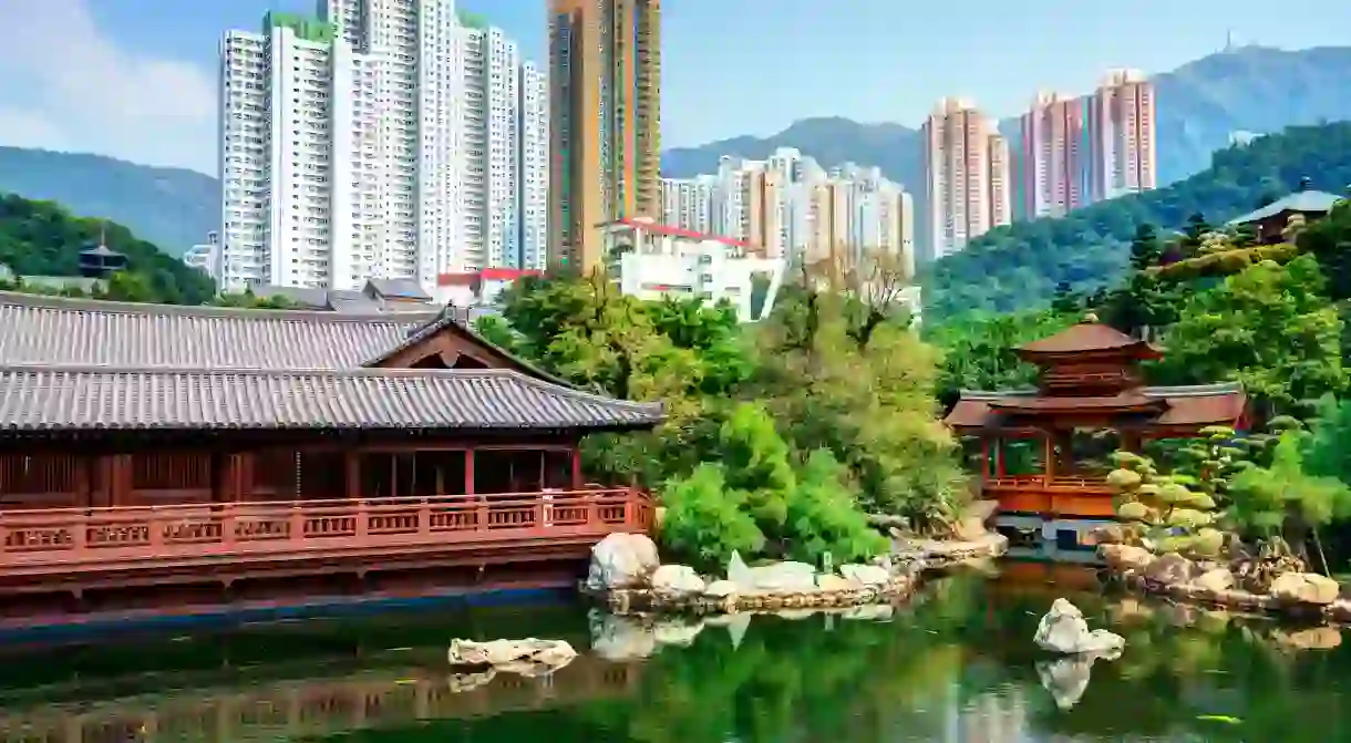 Pond and cityscape viewed from Nan Lian Garden in Hong Kong