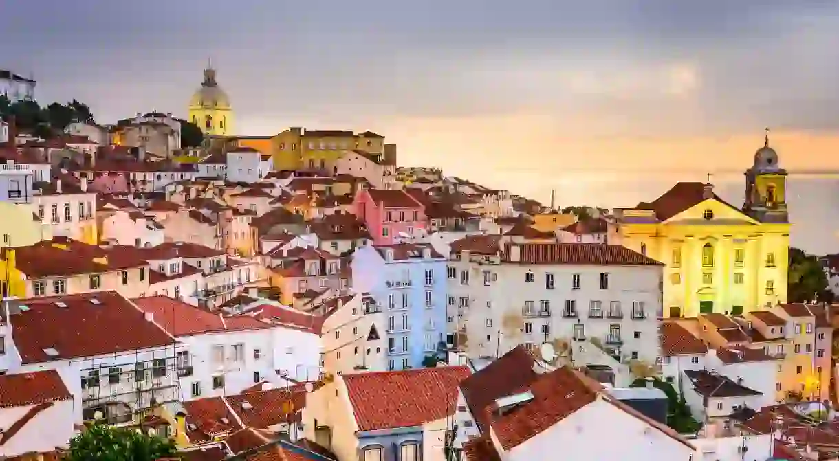 EGFGHC Lisbon, Portugal cityscape at the Alfama district at dawn.