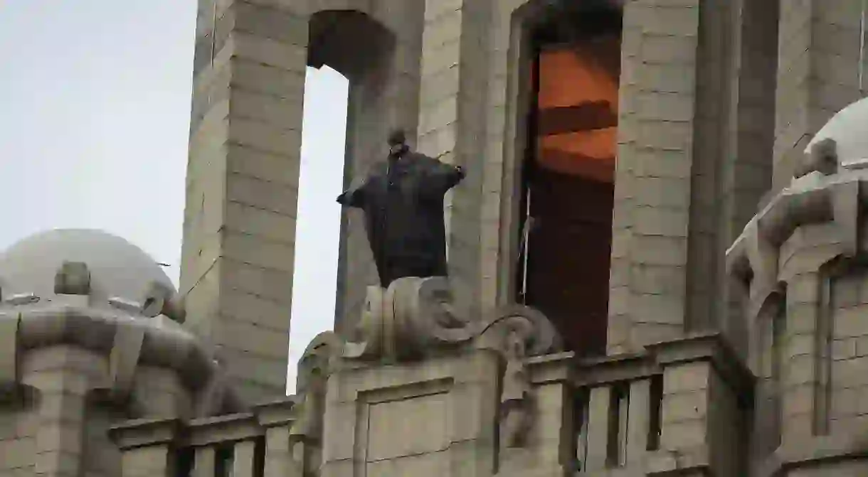 Robert Pattinsons stuntman is spotted on top of Liverpools iconic Liver Building for the new Batman movie