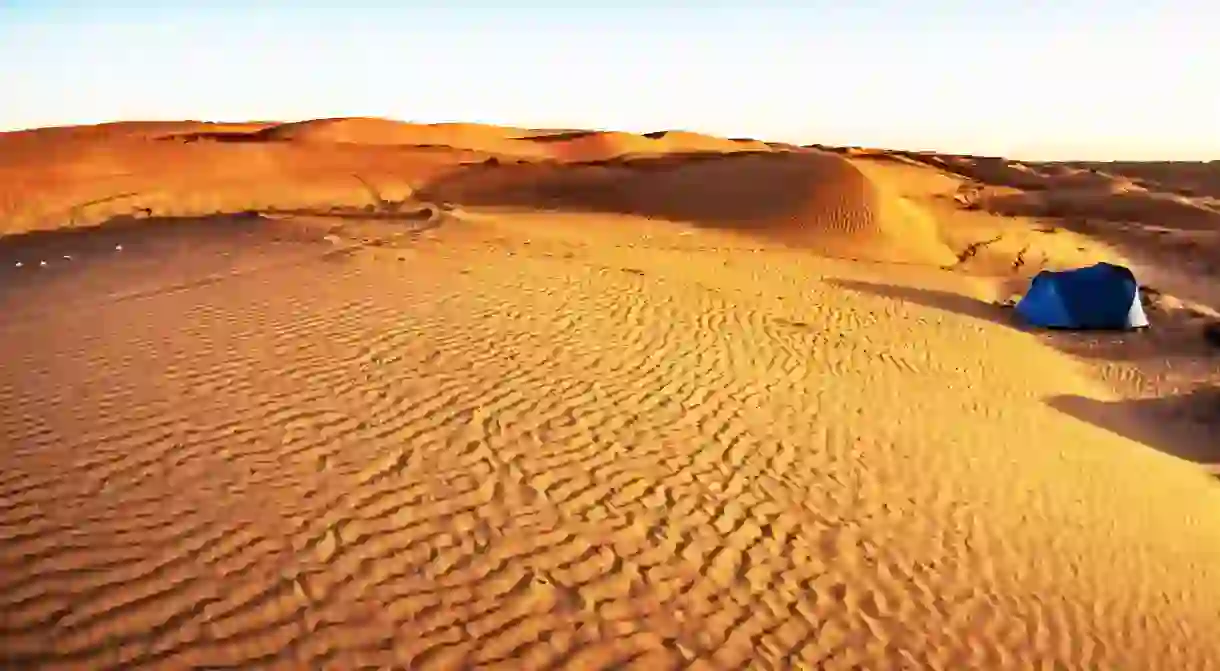 Pop up your tent among the dunes of Wahiba Sands for a glorious night in the desert