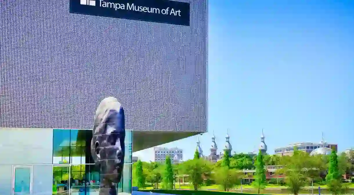 The modern Tampa Museum of Arts architecture contrast with the Moorish Revival style of University of Tampa in Florida