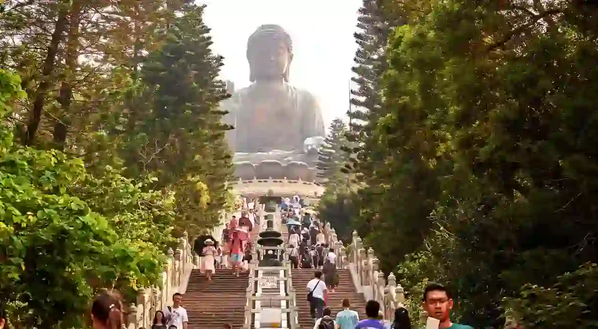 Visitors make the climb to see Big Buddha, Po Lin Monastery, Ngong Ping on Lantau Island