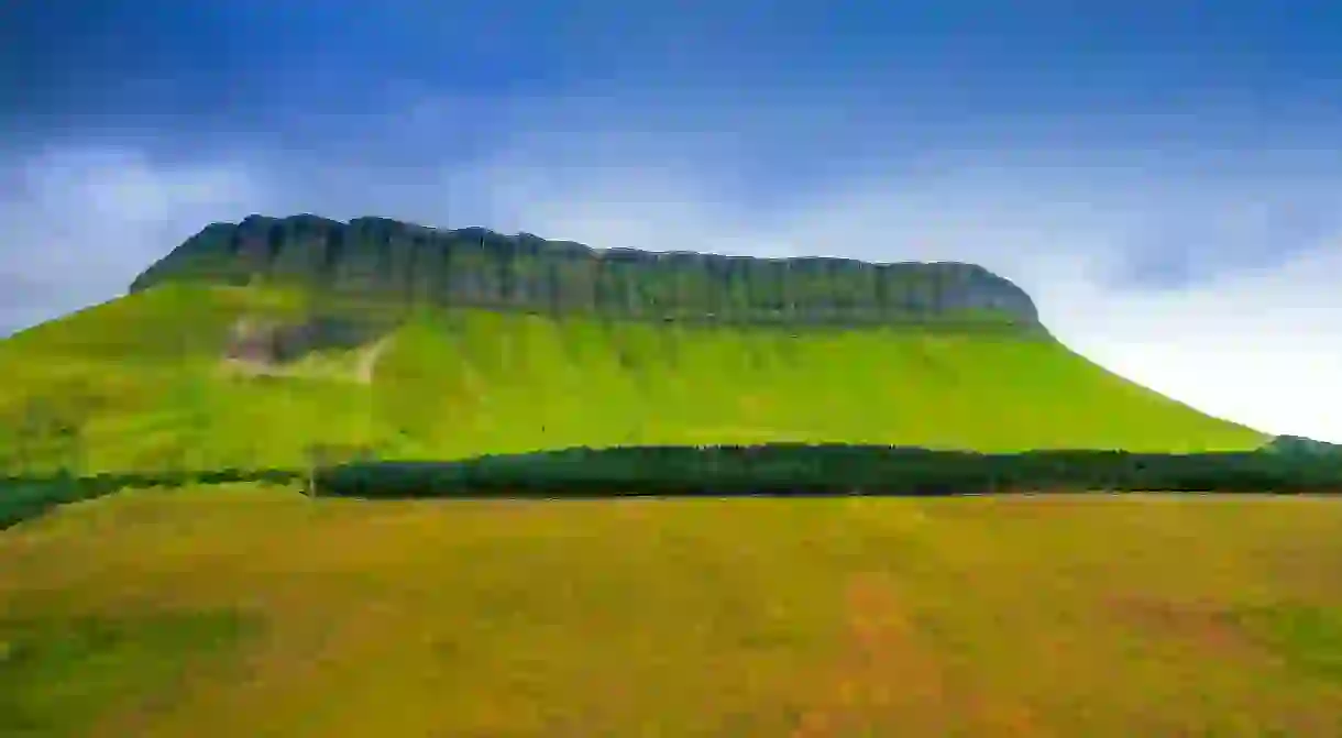 Benbulbin sometimes spelled Ben Bulben or Benbulben is a large rock formation in County Sligo Ireland