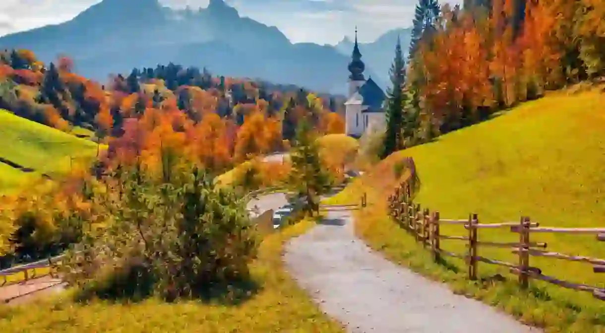 Iconic picture of Bavaria with Maria Gern church with Hochkalter peak on background.