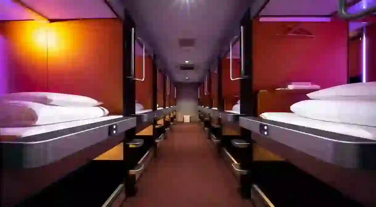 Experience Japans artfully efficient use of compact spaces with a stay at a capsule hotel