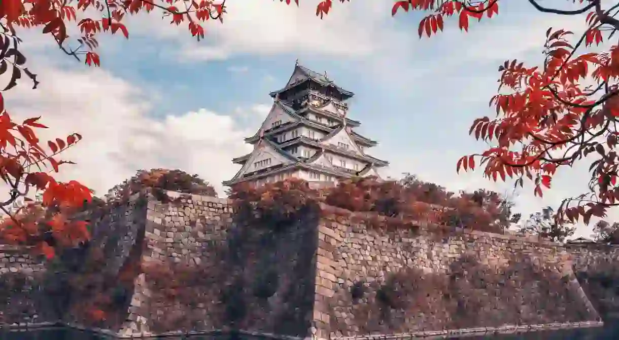 Osaka Castle is a beautiful and famous must-see landmark built on a stone platform