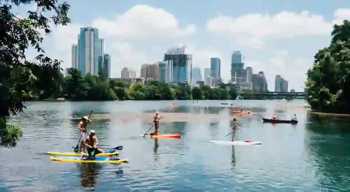 Downtown view over the water from Lou Neff point of Lady Bird Hike and Bike Trail. Austin, Texas, USA