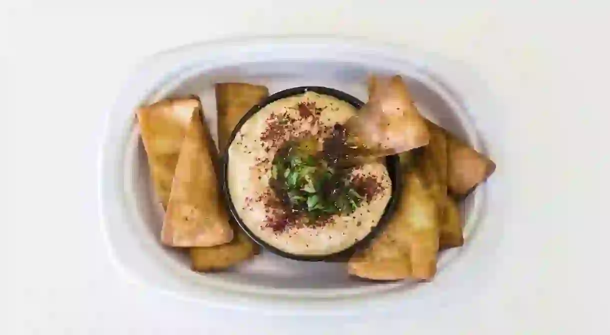 Plate of nachos and hummus