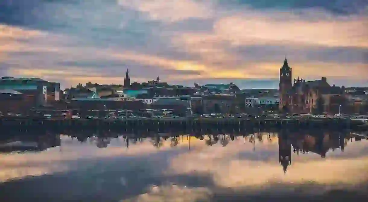 The sun sits low over the Cityside and the River Foyle, Londonderry, Northern Ireland