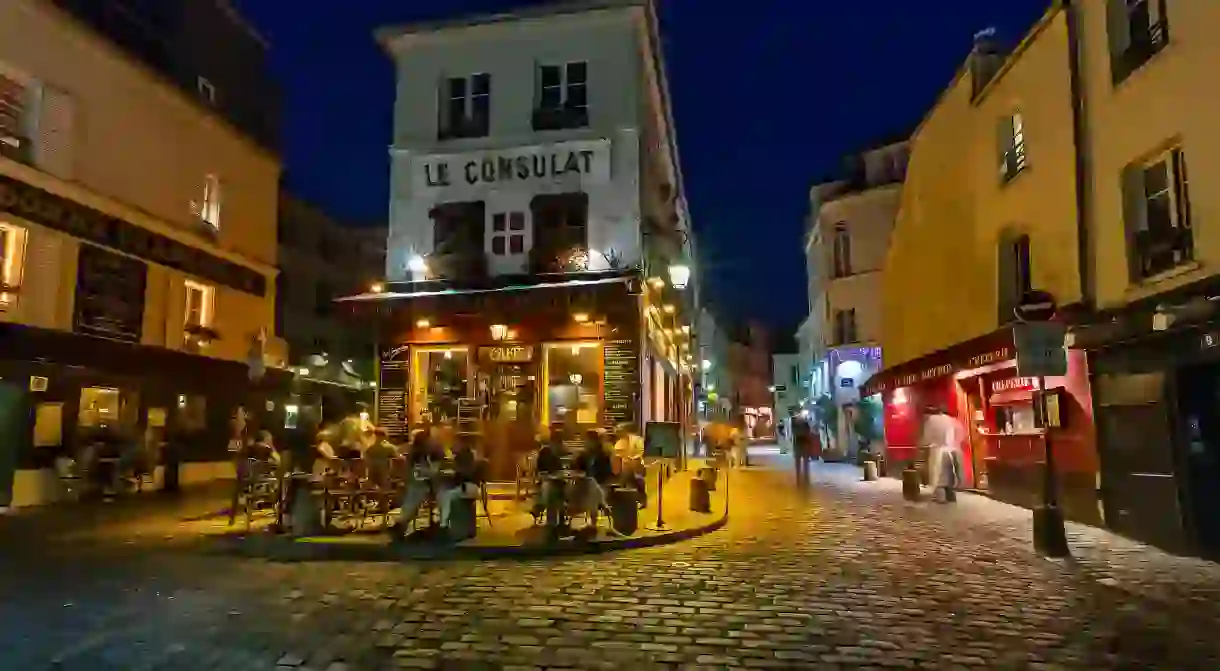 Cafe Le Consulat on Montmartre in Paris. Montmartre area is among most popular destinations in Paris and Le Consulat is a typical Paris cafe perfect for late night drinks