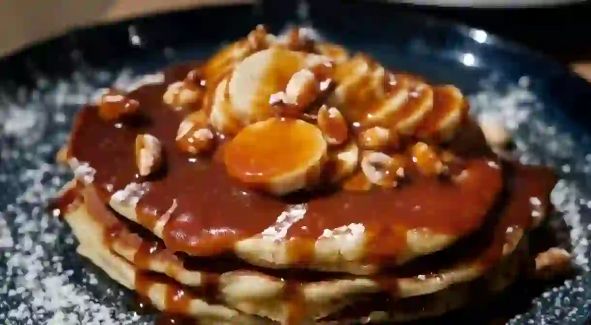 Banana, nuts and peanut butter American pancakes