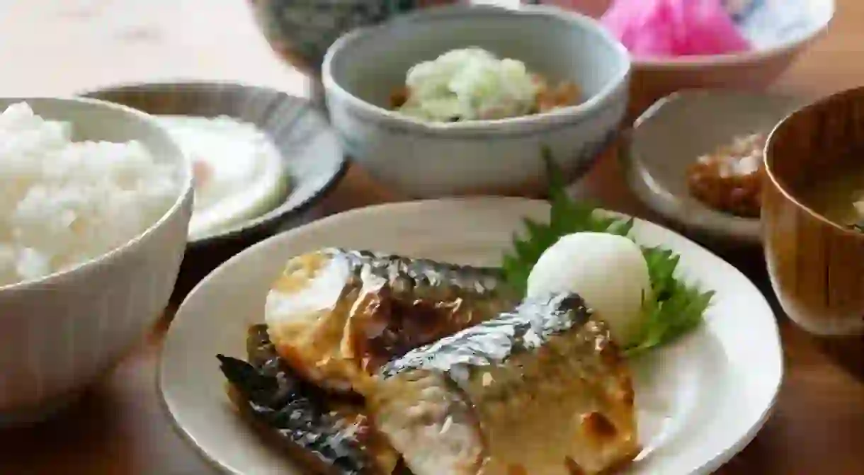 Japanese breakfast. traditional japanese food including rice, miso soup, fish and side dishes