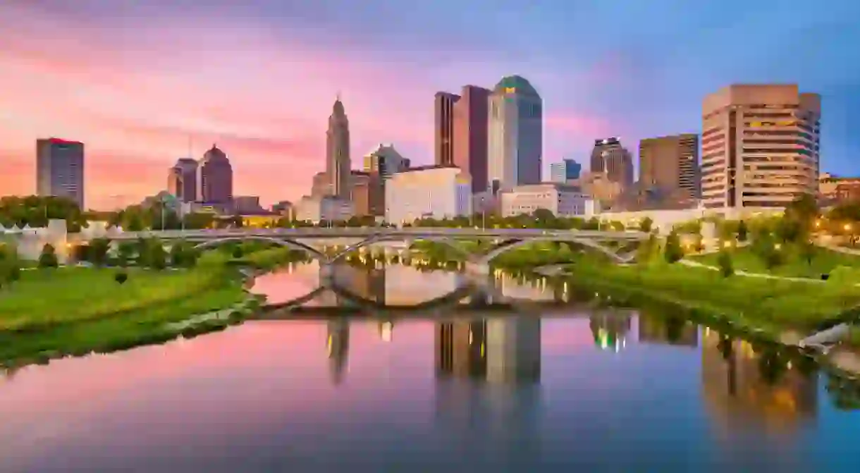 Columbus, Ohio, USA skyline on the river at dusk.