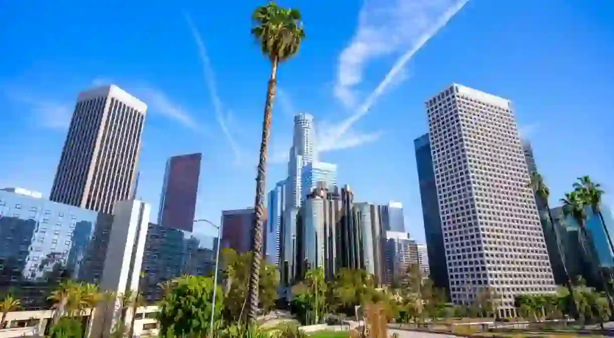 the skyline of Los Angeles under a blue sky