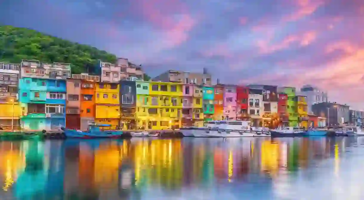 Cityscape of Colorful Zhengbin Fishing Port in Keelung near Taipei city, Taiwan at sunset