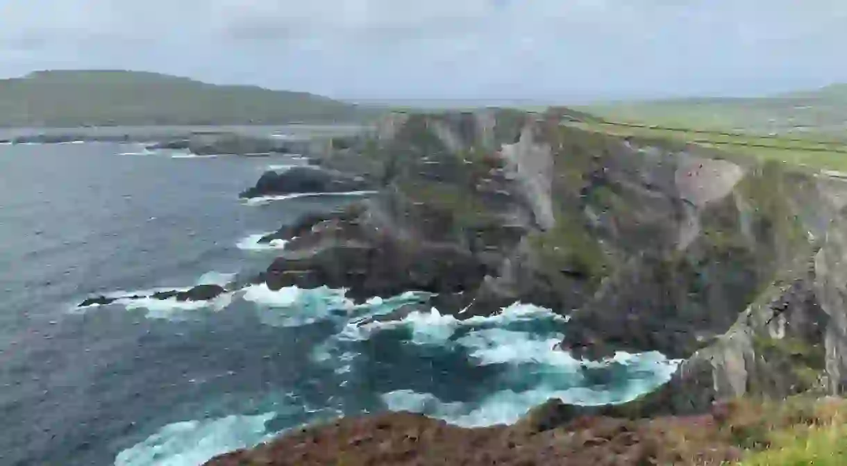 Scenic view of famous Kerry cliffs (Aillte Chiarrai). Irish coastal nature. Big Atlantic ocean waves. Kerry Cliffs viewpoint, Kerry, Ireland