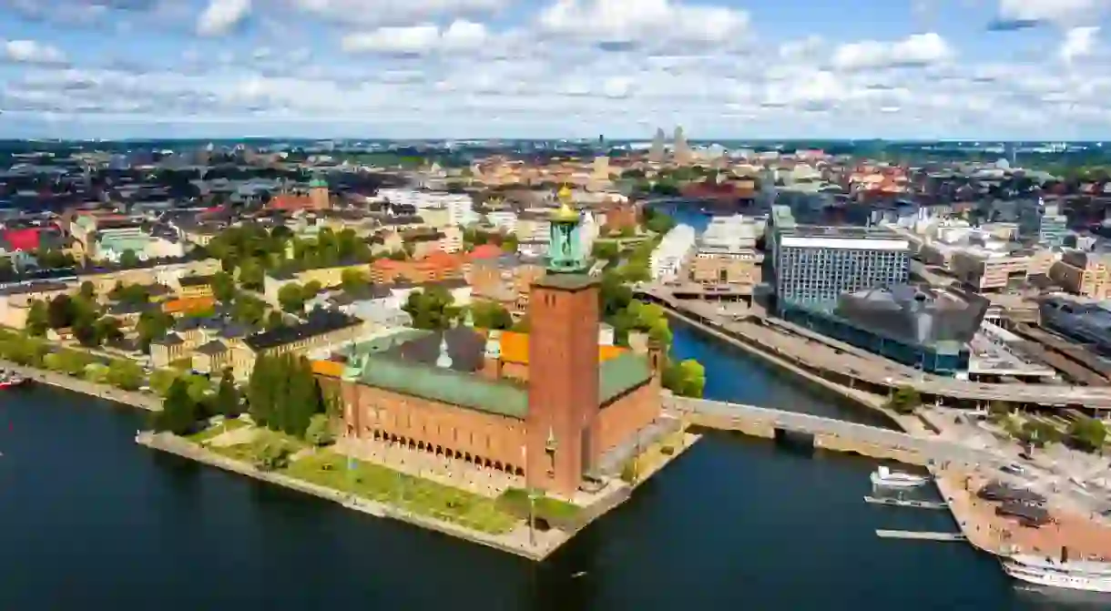 Stockholm, Sweden. Stockholm City Hall. Panorama of the city in summer in cloudy weather. Aerial view