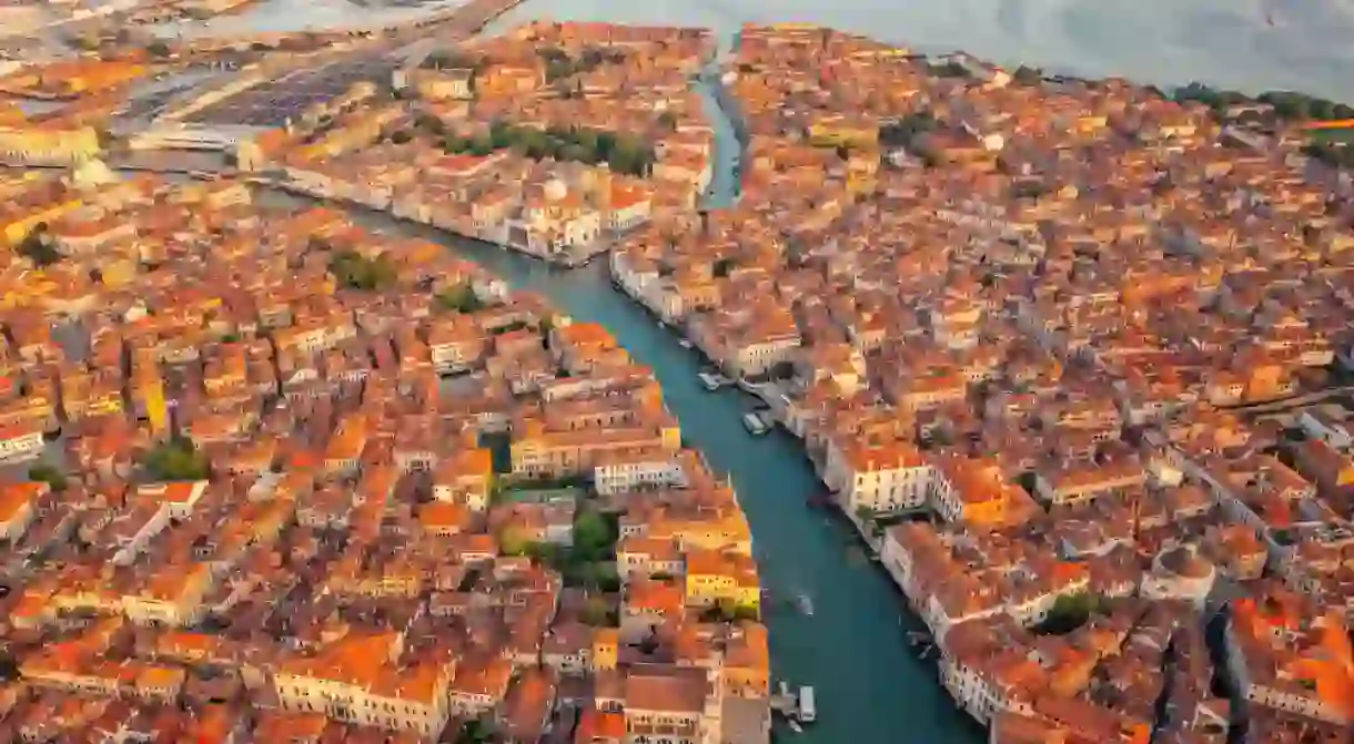 Incredible cityscape Venice and Venetian lagoon. Venice Grand Canal and buidings from drone, Italy