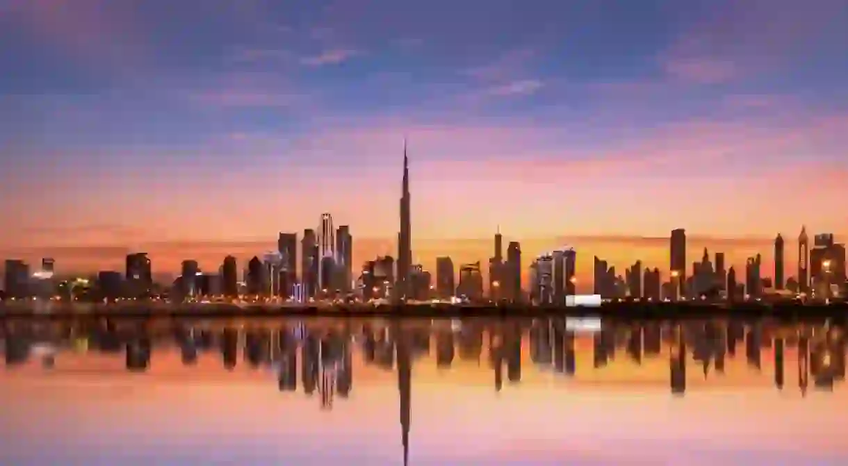 Panoramic Dubai skyline with Reflection in Pastel Sunset colors