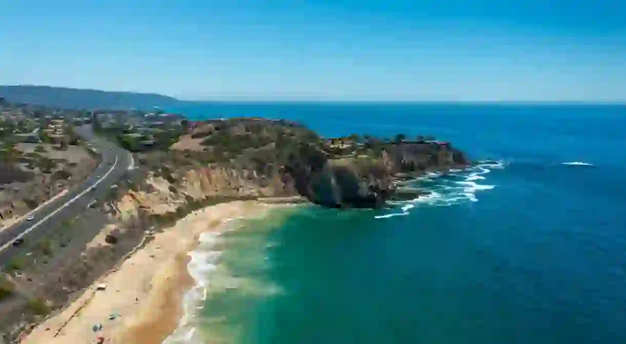 South-Facing Aerial Photo of a Beach and Protruding Cliffs Near Pacific Coast Highway in Newport Beach, California