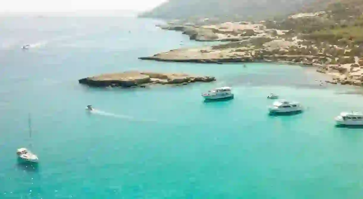 yachts on body of water at daytime