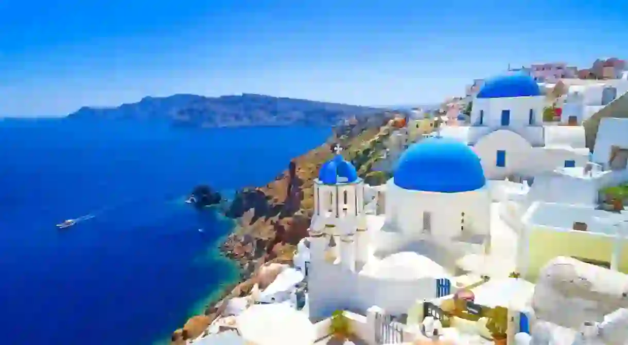 View of Oia town and aegean sea in Santorini island in Greece. Cyclades islands, Santorini Greek landscape.