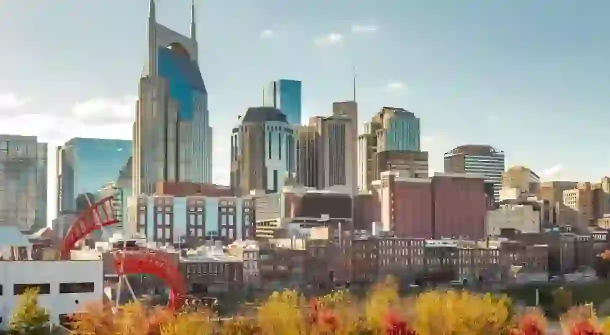 Downtown Nashville city skyline building view along the Cumberland River. Photo taken in Nashville Tennessee during a cloudy autumn day