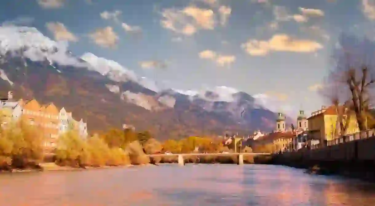 Panoramic view of sunset scene at Innsbruck cityscape, colorful historic buildings in Innsbruck, Austria