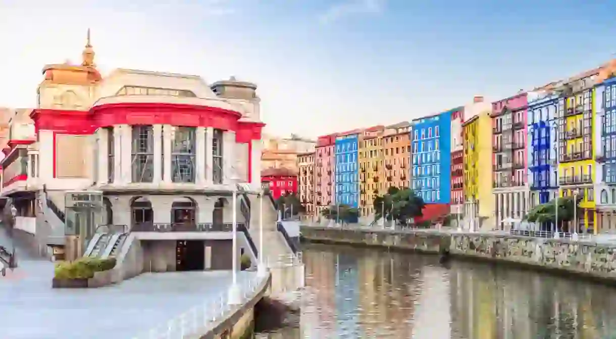 Spain - Bilbao old town cityscape on the riverbank at Basque Country - Market and colorful houses.