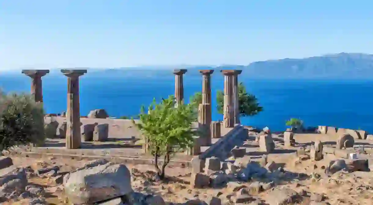 Antique columns off the coast of the Aegean Sea. Troy. Turkey