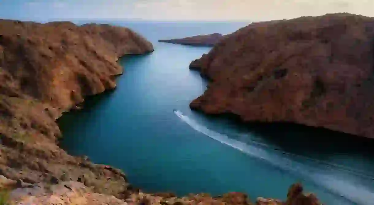 An aerial view of Bandar Al Khairan, Beautiful landscape with mountains and sea.