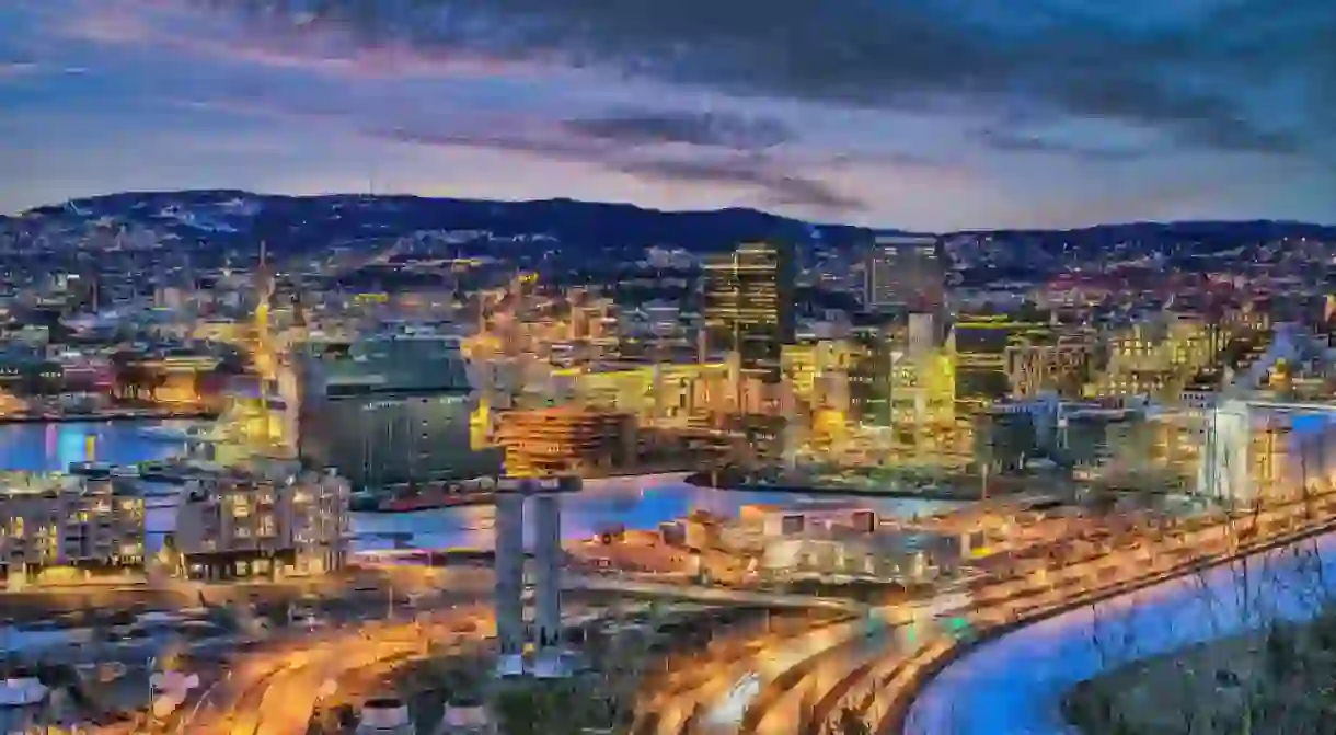 Oslo Norway, night city skyline at business district and Barcode Project