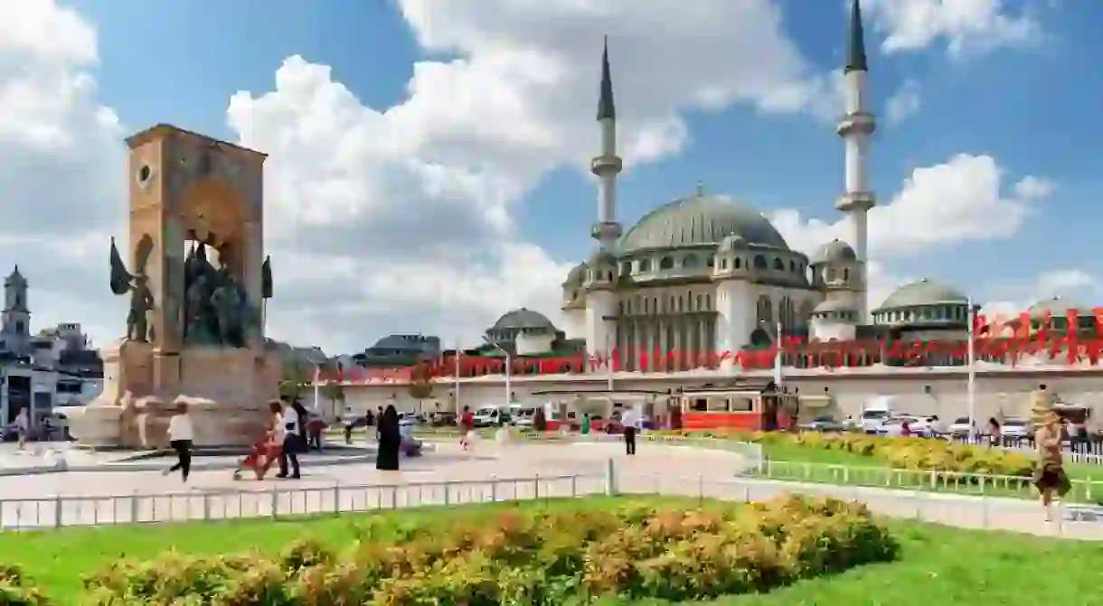 Taksim Mosque and the Republic Monument at the Taksim Square on sunny day.