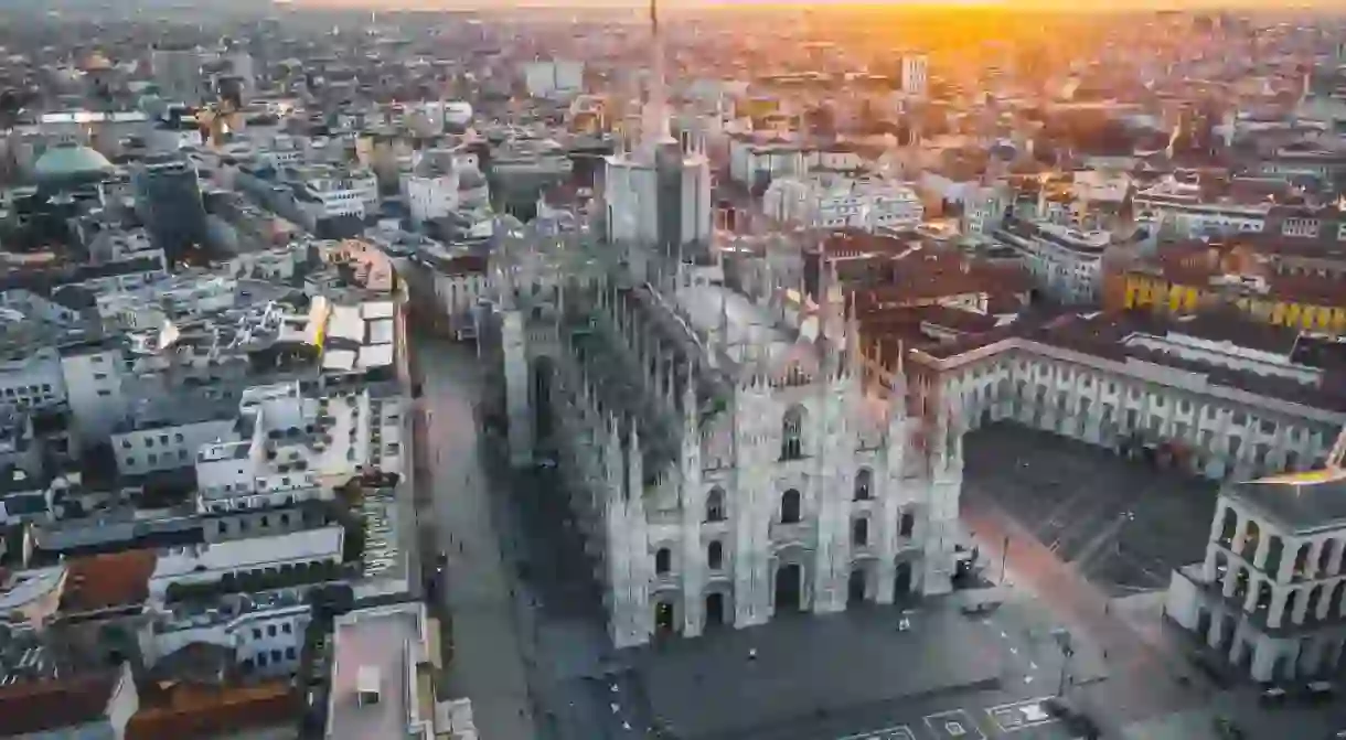 Drone photography Duomo cathedral at sunrise. Italy, Milan aerial view