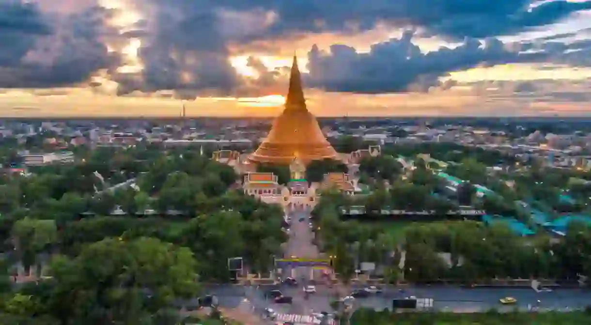 Large golden pagoda Located in the community at sunset