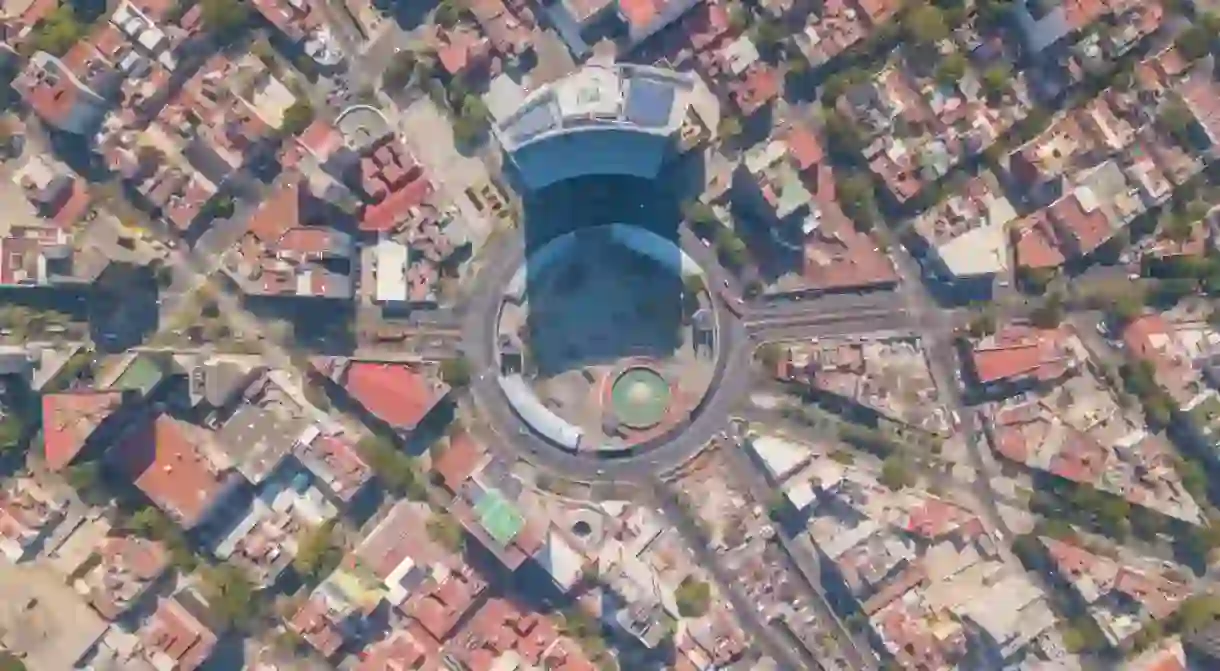 Aerial panoramic top view of the famous insurgents roundabout surrounded by buildings and houses